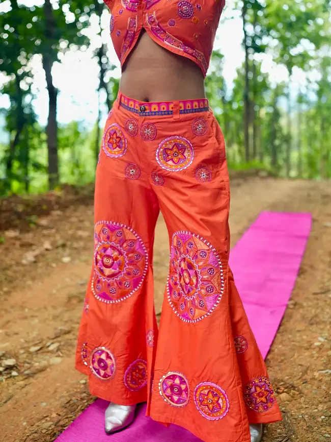 Model in blue top and skirt